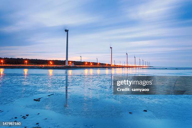 long exposure of clouds and wind turbines - sea ​​of ​​clouds stock pictures, royalty-free photos & images