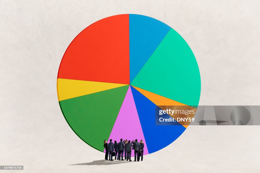 Large Group Graph Group Of People Looking Up At Large Pie Chart High-Res Stock Photo ...