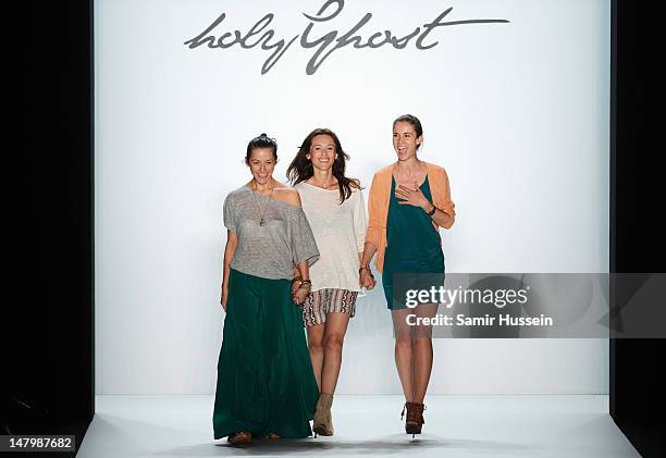 Designer Sedina Halilovic, Ivana Bogicevic and Jelena Radovanovic acknowledges the audience the runway during the Holy Ghost Show at Mercedes-Benz...