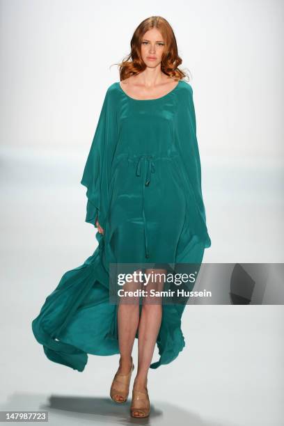 Model walks the runway during the Holy Ghost Show at Mercedes-Benz Fashion Week Spring/Summer 2013 on July 7, 2012 in Berlin, Germany.