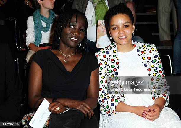 Auma and Akini Obama arrive for the Minx By Eva Lux Show at Mercedes-Benz Fashion Week Spring/Summer 2013 on July 7, 2012 in Berlin, Germany.