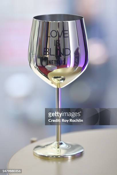 View of wine glass as Love Is Blind cast celebrates Netflix's first Live Reunion with the iconic pods at Rockefeller Center In New York City on April...