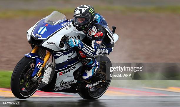 Second-place finisher Ben Spies of Yamaha Factory Racing team steers his bike during the qualifying session of the MotoGP of Germany at the...