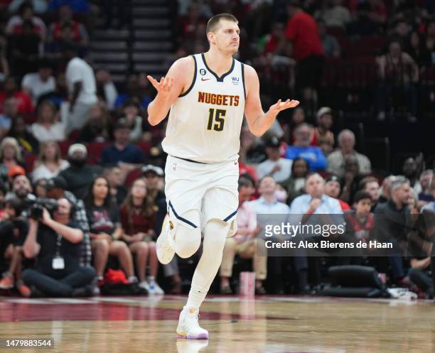 Nikola Jokic of the Denver Nuggets reacts after making a shot during the first half of the game against the Houston Rockets at Toyota Center on April...