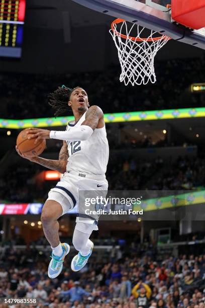 Ja Morant of the Memphis Grizzlies dunks during the first half against the Portland Trail Blazers at FedExForum on April 04, 2023 in Memphis,...