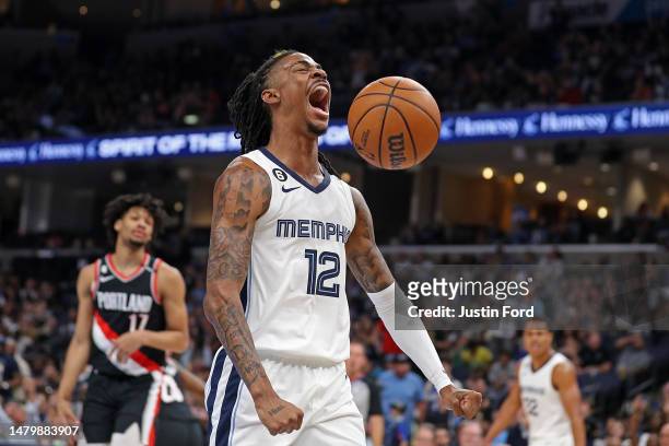 Ja Morant of the Memphis Grizzlies reacts during the first half against the Portland Trail Blazers at FedExForum on April 04, 2023 in Memphis,...
