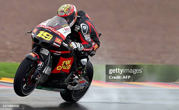 Spain's Alvaro Bautista of San Carlo Honda Gresini team steers his bike during the qualifying session of the MotoGP of Germany at the Sachsenring...