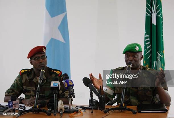 In this photgraph released by the African Union-United Nations Information Support Team, outgoing African Union Mission in Somalia spokesperson Lt....