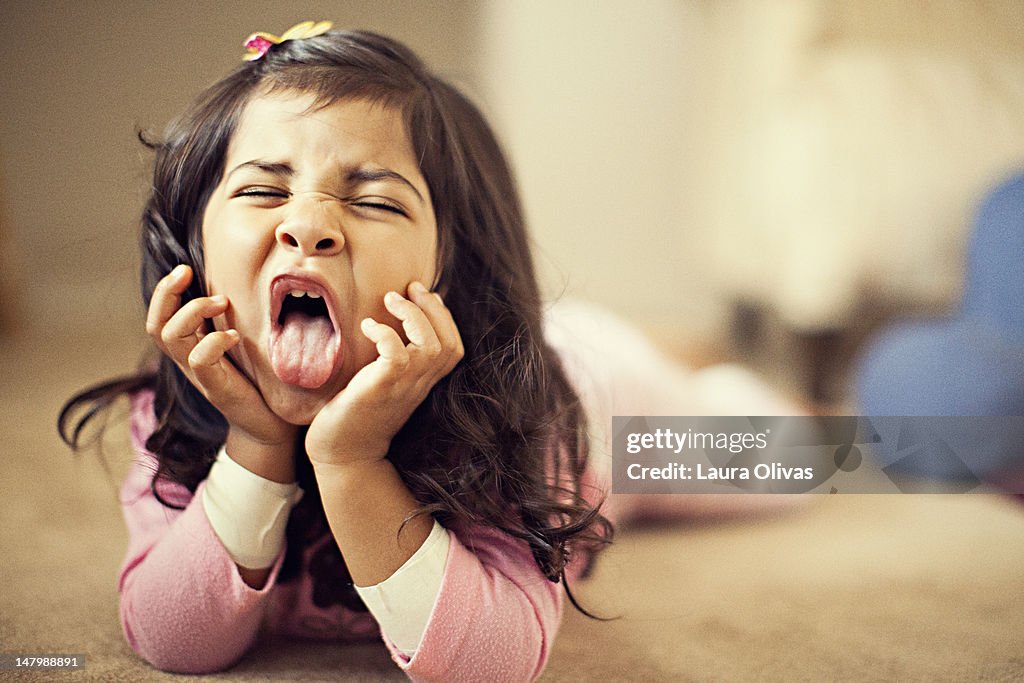 Girl sticking her tongue out playfully