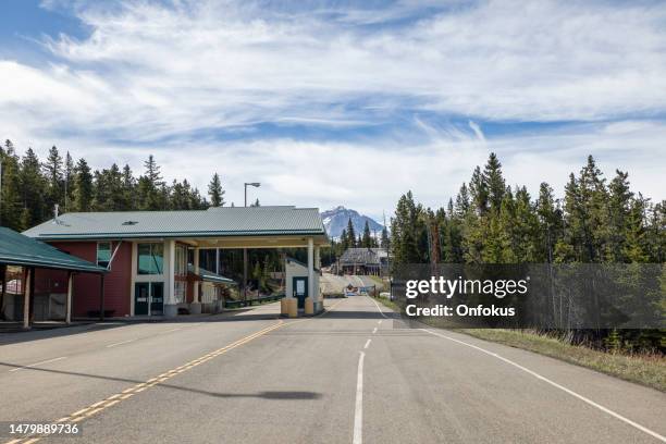 chief mountain border crossing between canada and usa in waterton lakes, alberta, canada. - canada border stock pictures, royalty-free photos & images