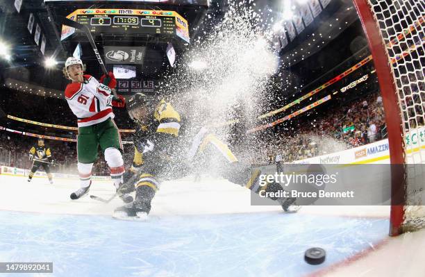 Dawson Mercer of the New Jersey Devils scores a hattrick goal during the third period against the Pittsburgh Penguins at the Prudential Center on...