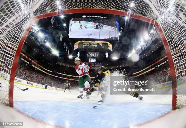 Dawson Mercer of the New Jersey Devils scores a hattrick goal during the third period against the Pittsburgh Penguins at the Prudential Center on...