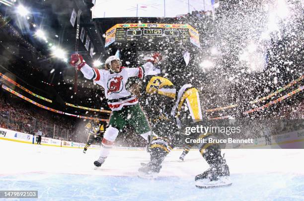 Dawson Mercer of the New Jersey Devils celebrates his hattrick goal during the third period against the Pittsburgh Penguins at the Prudential Center...