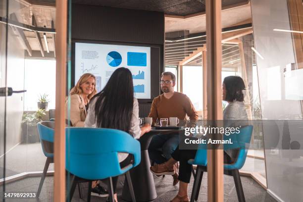mixed race marketing team brainstorming for a new product release - communication stock pictures, royalty-free photos & images