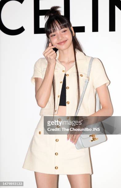 South Korean rapper Lisa of girl group BLACKPINK is seen at the "CELINE" pop-up store opening event at The Hyundai Yeouido on March 30, 2023 in...
