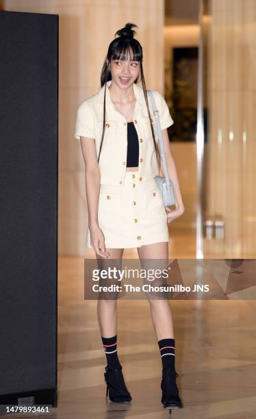 South Korean rapper Lisa of girl group BLACKPINK is seen at the "CELINE" pop-up store opening event at The Hyundai Yeouido on March 30, 2023 in...