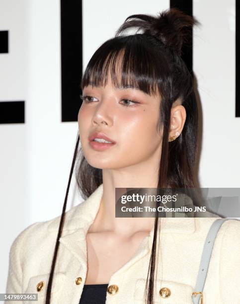 South Korean rapper Lisa of girl group BLACKPINK is seen at the "CELINE" pop-up store opening event at The Hyundai Yeouido on March 30, 2023 in...