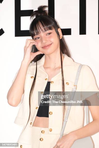 South Korean rapper Lisa of girl group BLACKPINK is seen at the "CELINE" pop-up store opening event at The Hyundai Yeouido on March 30, 2023 in...