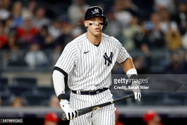 Aaron Judge of the New York Yankees is walked to first during the ninth inning against the Philadelphia Phillies at Yankee Stadium on April 04, 2023...