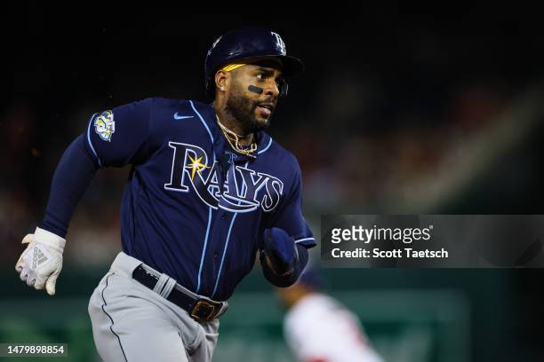 Yandy Diaz of the Tampa Bay Rays scores on a double off the bat of Randy Arozarena against the Washington Nationals in the eighth inning at Nationals...