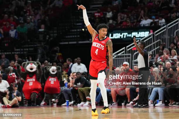 Jalen Green of the Houston Rockets reacts after sinking a three point shot in the fourth quarter of the game against the Denver Nuggets at Toyota...