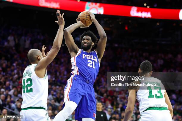 Joel Embiid of the Philadelphia 76ers shoots over Al Horford of the Boston Celtics during the second quarter at Wells Fargo Center on April 04, 2023...