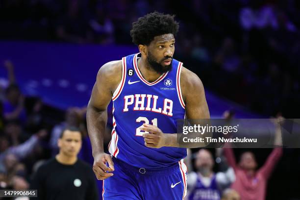 Joel Embiid of the Philadelphia 76ers reacts during the fourth quarter against the Boston Celtics at Wells Fargo Center on April 04, 2023 in...