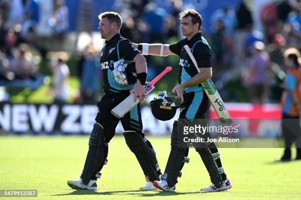 Tim Seifert and Tom Latham of New Zealand walk off the field after winning game two of the T20 International series between New Zealand and Sri Lanka...