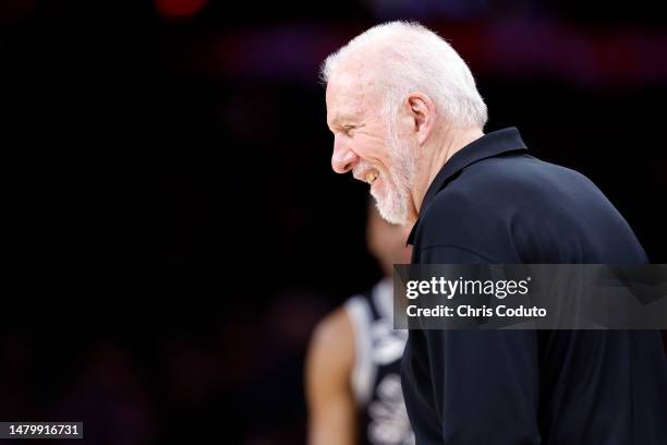 Head coach Gregg Popovich of the San Antonio Spurs smiles during the second half against the Phoenix Suns at Footprint Center on April 04, 2023 in...