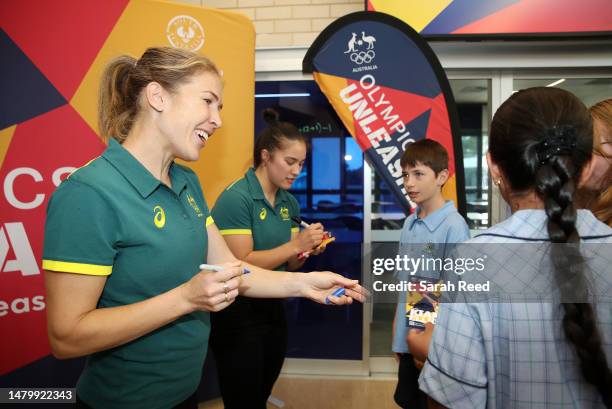 Jessica Stenson and Kiana Elliot sign autographs for School students during Olympic Unleashed: South Australia at Modbury High School on April 05,...