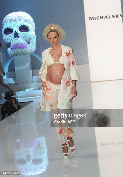 Pregnant model Patricia Kaiser presents fashion by German designer Michael Michalsky during the Michalsky Style Night offsite at the Mercedes-Benz...