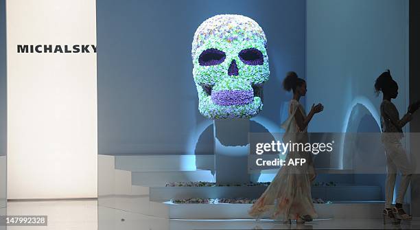Models present fashion by German designer Michael Michalsky during the Michalsky Style Night offsite at the Mercedes-Benz Fashion Week in Berlin on...