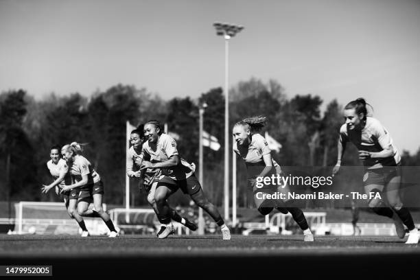 Alessia Russo, Lucy Bronze, Lauren James, Katie Robinson and Ella Toone in action during a training session at St George's Park on April 04, 2023 in...