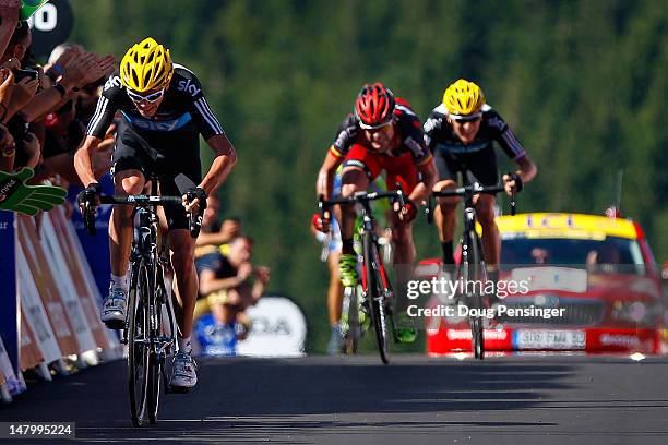 Christopher Froome of Great Britian riding for Sky Procycling sprints for the finish line to win stage seven of the 2012 Tour de France ahead of...