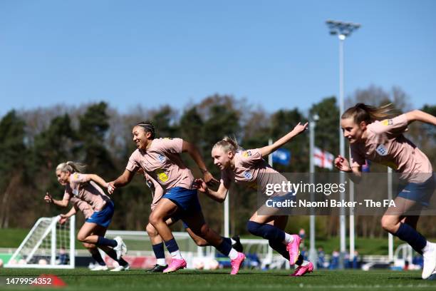 Alessia Russo, Lucy Bronze, Lauren James, Katie Robinson and Ella Toone in action during a training session at St George's Park on April 04, 2023 in...