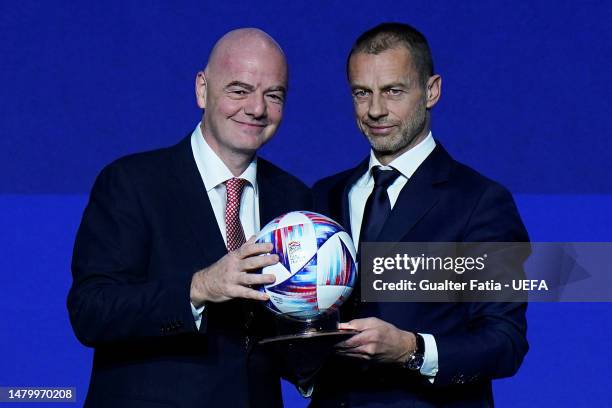 President Gianni Infantino and UEFA President Aleksander Ceferin pose for a photograph with a football during the 47th UEFA Ordinary Congress meeting...