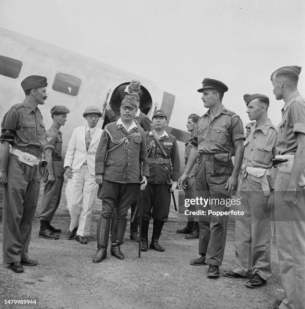 General Navta and other officers of the Japanese Southern Army arrive by plane prior to signing the formal surrender of all Japanese forces in South...