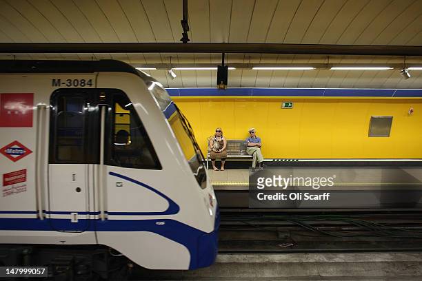 Passengers travel on the Metro underground train network on July 7, 2012 in Madrid, Spain. Despite having the fourth largest economy in the Eurozone,...