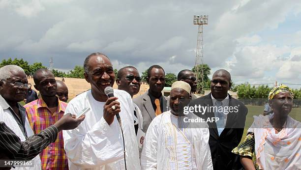 Supporters of Mali's former junta leader Amadou Sanogo take part in a demonstration against the meeting of ECOWAS leaders in Bamako on July 7, 2012....