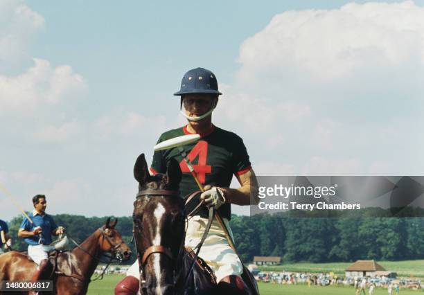 British Royal Prince Philip, Duke of Edinburgh, on horseback at Cowdray Park Polo Club, where the Prince is competing, in the grounds of Cowdray...
