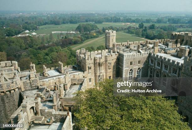 High-angle view of the Upper Ward of Windsor Castle and the countryside beyond, photographed from atop the Round Tower in the Castle's Middle Ward,...
