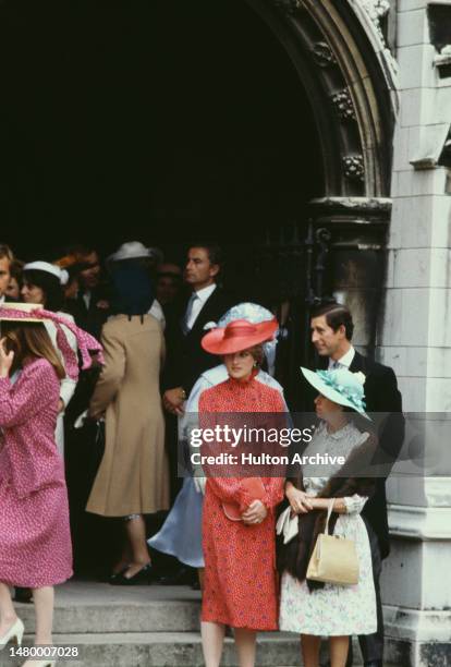 British Royal Lady Diana Spencer, wearing a red Catherine Walker dress, Charles, Prince of Wales and Princess Margaret, Countess of Snowdon attend...