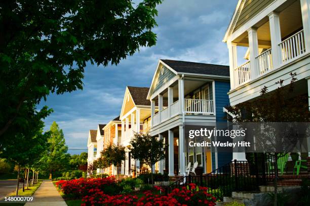 a row of colorful suburban homes - fayetteville foto e immagini stock