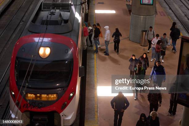 Several people on the platform of a commuter train at Almudena Grandes-Atocha Cercanias station, April 5 in Madrid, Spain. Renfe is offering nearly 2...