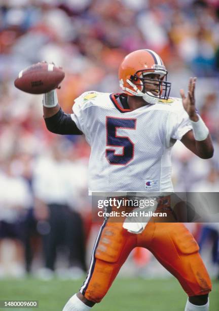Marvin Graves, Quarterback for the University of Syracuse Orangemen throws a pass downfield during the NCAA Hall of Fame Bowl college football game...