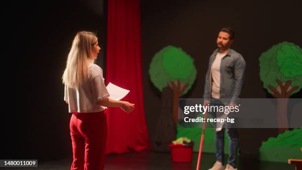 two of theater stage performers rehearsing on stage - improv stock pictures, royalty-free photos & images