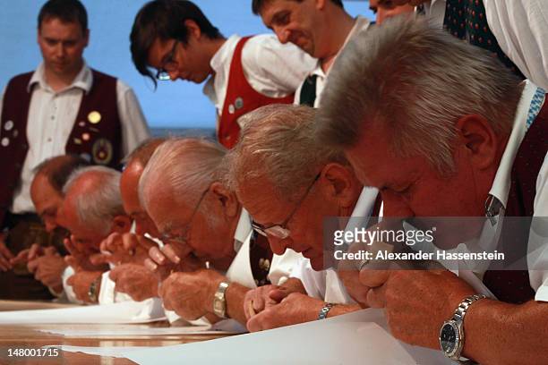 Competitors take snuff during 18th Snuff World Championships on July 7, 2012 in Peutenhausen near Munich, Germany. 290 participants from Germany,...