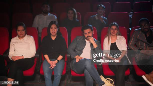 audiences sitting on seats and enjoying their time - fans in the front row stock pictures, royalty-free photos & images