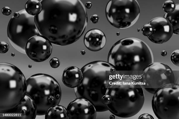 shiny black circles. 3d bubbles, spheres, drops on gray background. - black balloons stock pictures, royalty-free photos & images