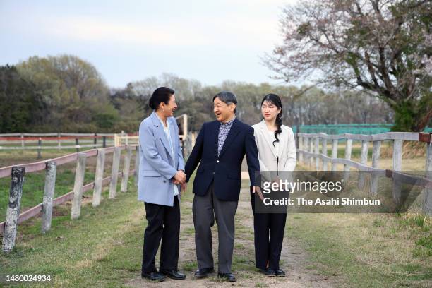 Emperor Naruhito , Empress Masako and Princess Aiko stroll at the Imperial Stock Farm on April 5, 2023 in Takanezawa, Tochigi, Japan.
